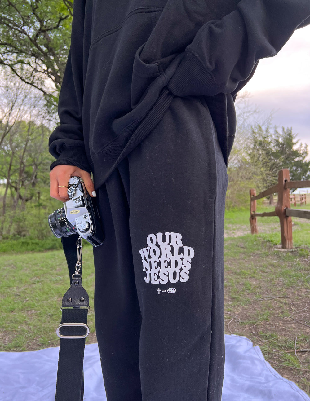 Our-World-Needs-Jesus-Black-Unisex-Sweatpant_04_9f97c99c-1d79-441e-ab07-7a2bfad78131.jpg